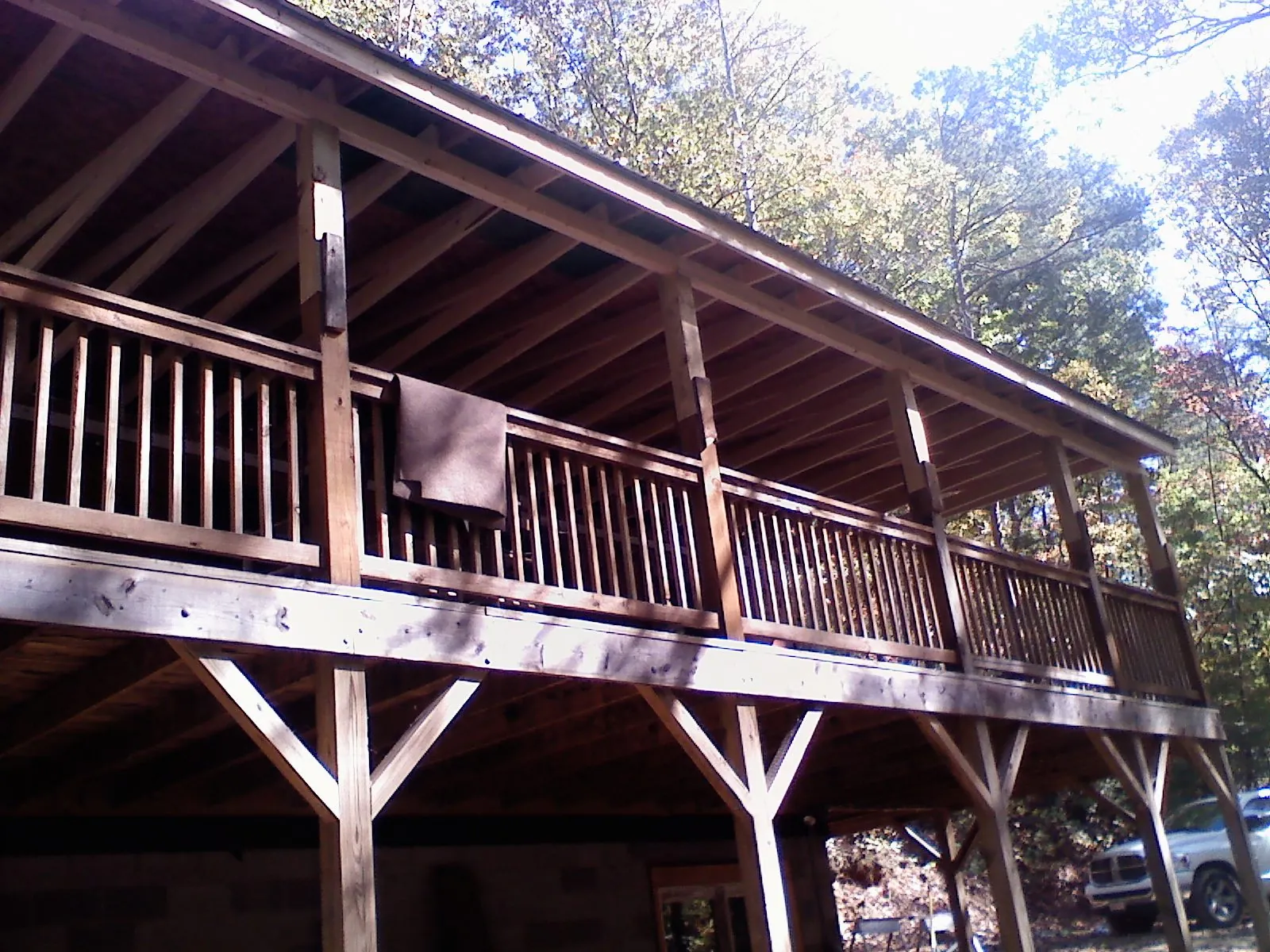 Timber framing under a new elevated porch and deck — Roof Leak Repair in Zanesfield by Roofing Brothers